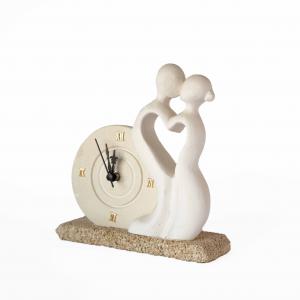 Orologio AMORINI scultura decorazione bomboniera in Carparo e Pietra Leccese salentina misure 19x16 cm del brand Maestro d'arte De Iaco Alfredo, categoria: Artigianato salentino > Pietra leccese e carparo > Lampade e Orologi.