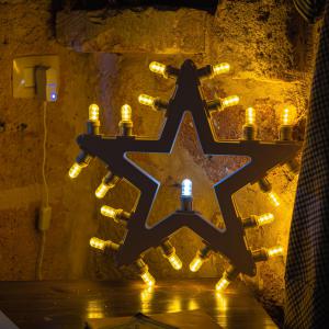 Lampada da parete in Legno STELLA DI NATALE 44x42 cm LUMINARIA d'arredo pugliese 21 lampadine colorate del brand Lupia, categoria: Artigianato salentino > Luminarie Salentine > Luminaria.