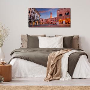 Lupia - Quadro moderno su Tela Canvas DEEP 65X143 cm, con paesaggi e localismi italiani, per casa, soggiorno, capezzale camera da letto, hotel, ufficio, TREVISO - PIAZZA DEI SIGNORI SERA      del brand Lupia, categoria: Arredo e decorazioni > Quadri e Tele > Quadri cittÃ  e Localismi.